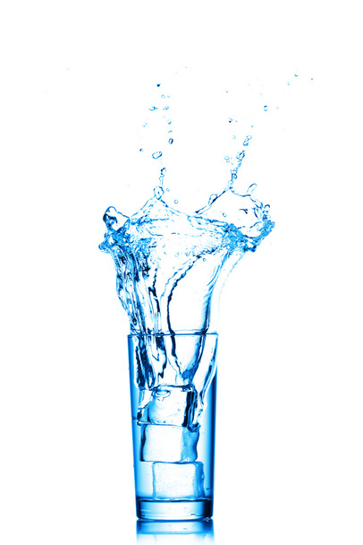 Water splashes in the glass isolated on white - Foto, imagen