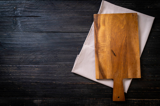 empty cutting wooden board with kitchen cloth - Photo, image