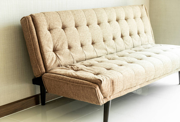Modern fabric sofa in room  - Foto, afbeelding