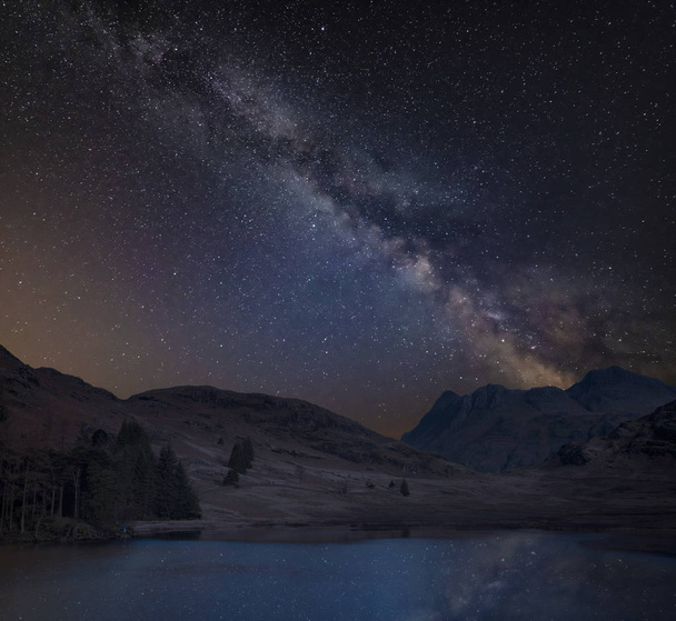 Digital composite image of Milky Way over beautiful landscape im - Photo, Image