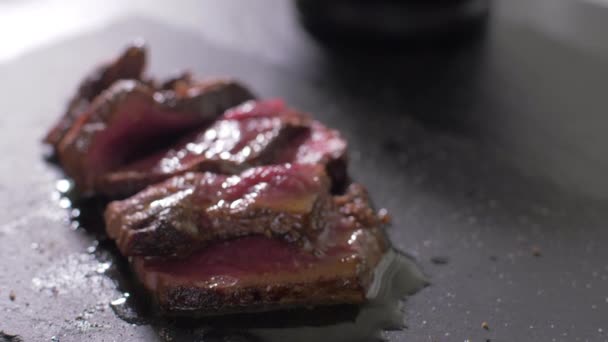 The chef garnishes the fillet with rosemary - Filmati, video