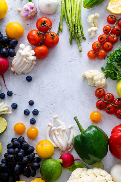 set of colorful fresh vegetables on concrete background. Summer food ingredients concept, top view  - Foto, Imagen
