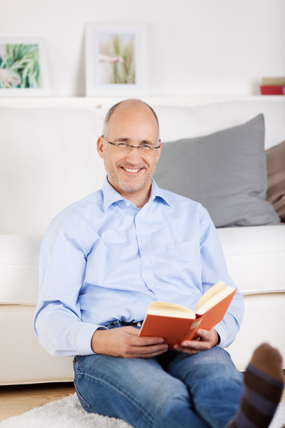 Bald man with book - Photo, Image