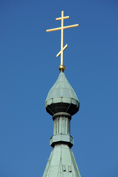 Una cruz ortodoxa dorada
 - Foto, imagen