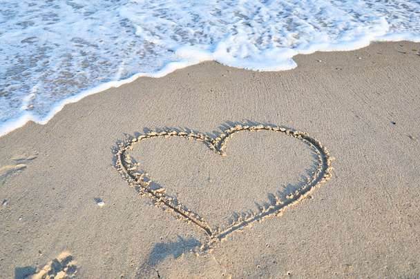 Love message on the beach sand - vacation and travel concep - Photo, Image