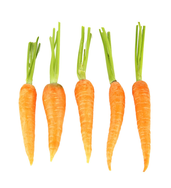 Heap of carrots, isolated on white - Photo, Image