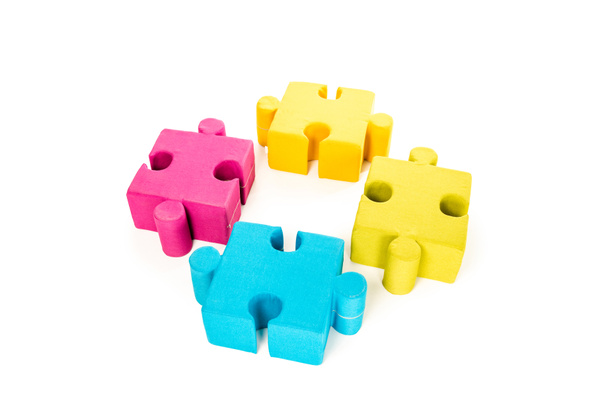 colorful arranged jigsaw puzzle pieces isolated on white - Фото, изображение