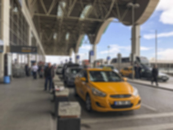Blurred background with taxi and people at terminal - Photo, Image