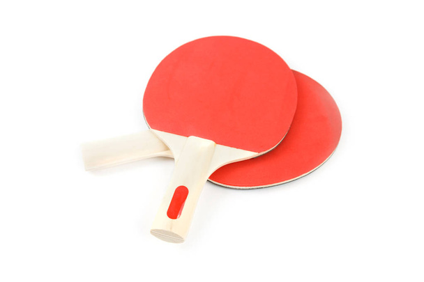 PIN-Pong rubbers en een bal - Foto, afbeelding