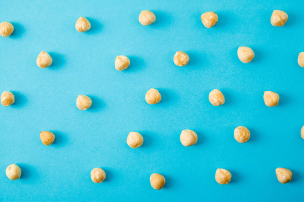 Nuts pattern - hazelnut on white background. - Foto, Imagen