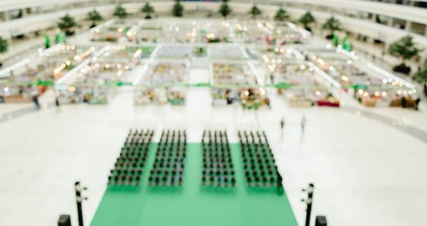 Exhibition hall with people and Green Stage with Audience chair - Photo, Image