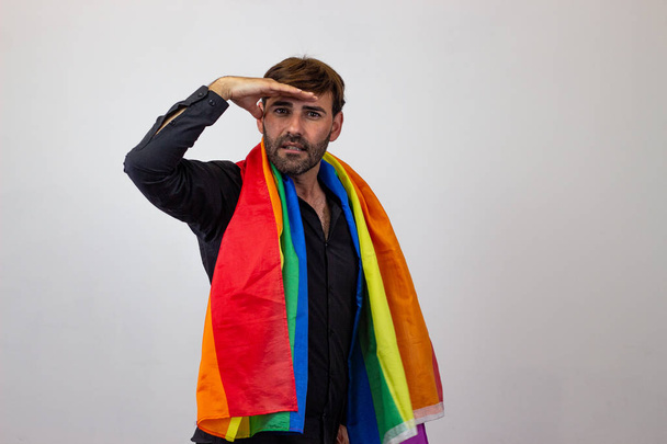 Portrait of handsome young man with gay pride movement LGBT Rain - Photo, Image