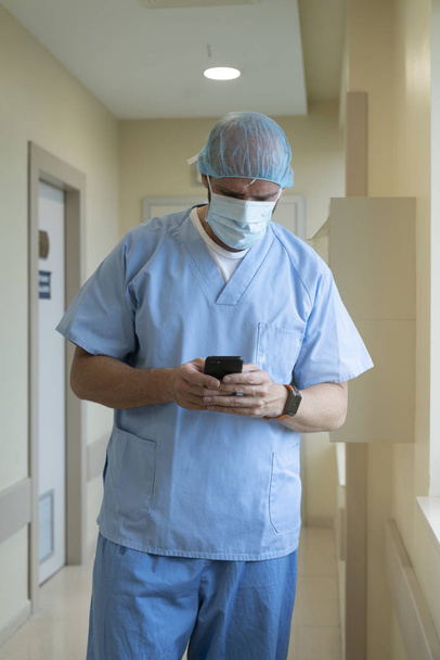 Doctor using mobile in hospital. Medical concept - Фото, изображение