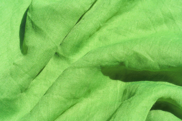 Texture di tessuto verde chiaro. Sfondo astratto verde chiaro. Primo piano tessuto verde
. - Foto, immagini