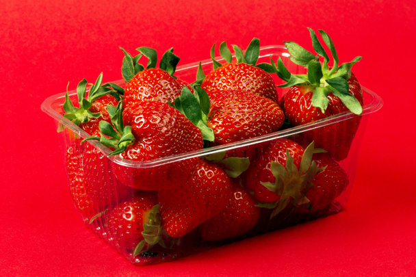 strawberries in plastic package - Photo, Image