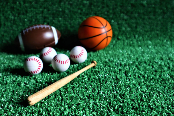 sports equipment on Green background - Foto, afbeelding