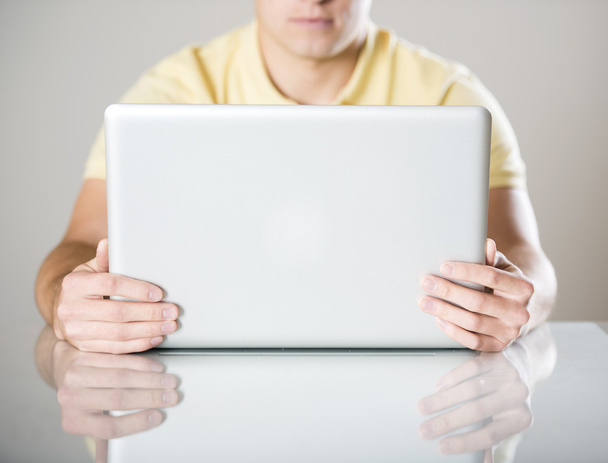 Man with laptop - Foto, afbeelding