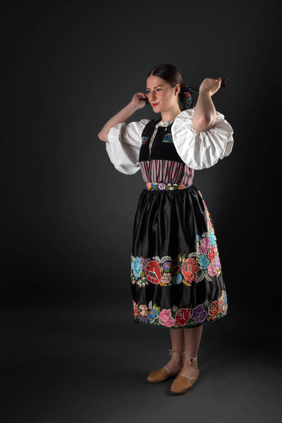 Slovak folklore. Slovakian folklore girl. Studio portrait. - Valokuva, kuva