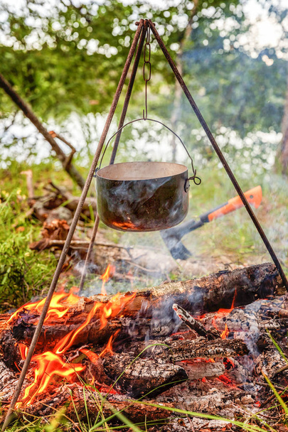 Pot over a campfire - Photo, Image