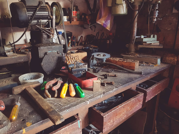 Desktop and tools in the garage workshop - Photo, Image