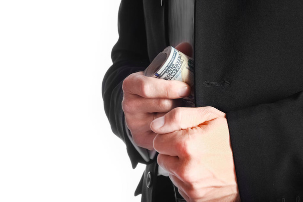 Business man holding money on white background - Zdjęcie, obraz