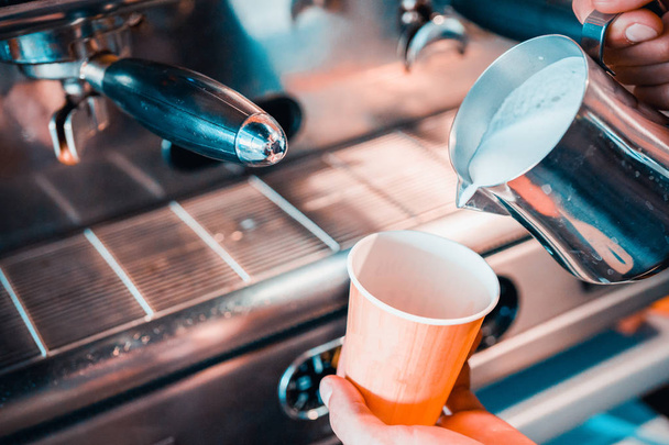 milk is poured into coffee - Fotografie, Obrázek
