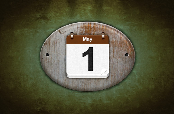 παλιό ξύλινο ημερολόγιο με 1 Μαΐου. - Φωτογραφία, εικόνα