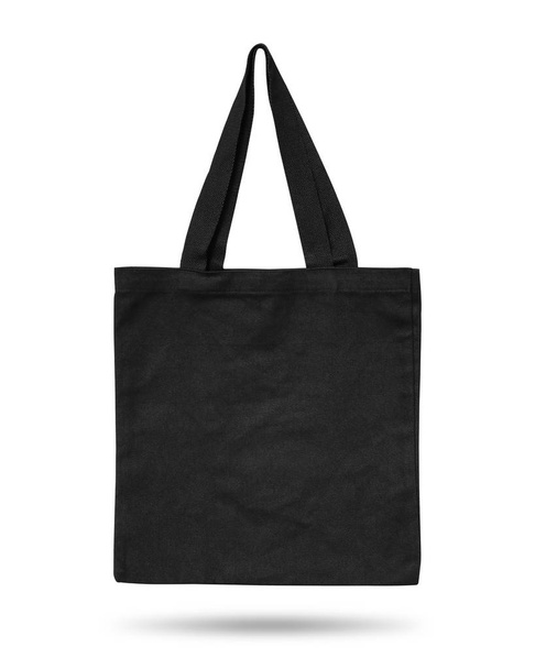 Μαύρη τσάντα υφάσματος απομονώθηκε σε λευκό φόντο. Τσάντα υφασμάτων για το σχέδιό σας. Ανακυκλωμένο υλικό. Αντικείμενο διαδρομών αποκοπής. - Φωτογραφία, εικόνα