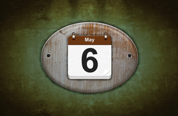 Старий дерев'яний календар з 6 травня
. - Фото, зображення