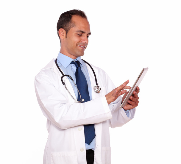 Attractive medical doctor using his tablet pc - Zdjęcie, obraz