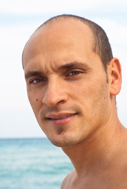 Portrait d'homme sur la plage
 - Photo, image