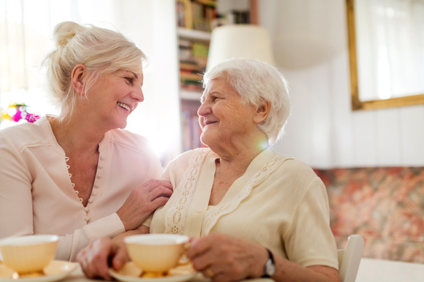 Senior woman spending quality time with her daughter - Foto, imagen