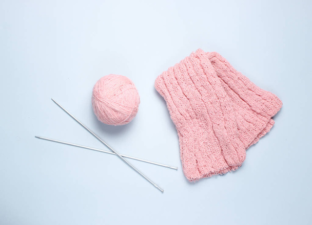 Knitting needles, thread balls, yarn on a gray background. - Photo, Image