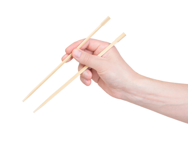 beyaz zemin üzerinde elinde chopsticks - Fotoğraf, Görsel