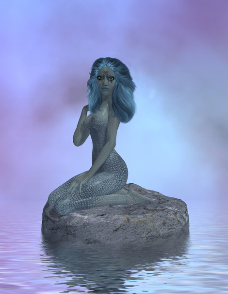 Sirene zittend op een rots - Foto, afbeelding
