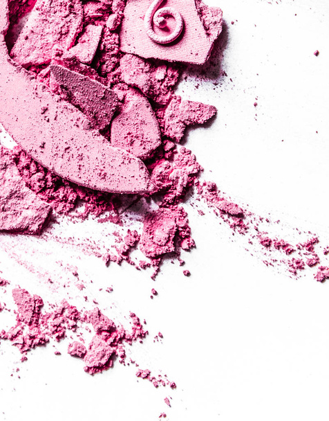 Crushed eyeshadows, lipstick and powder isolated on white backgr - Photo, Image