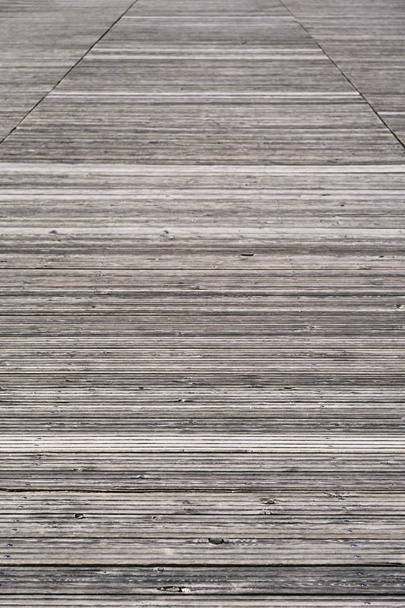 weathered old wooden boardwalk background - Фото, изображение