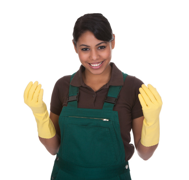 Young Female Gardner Wearing Gloves - Foto, immagini
