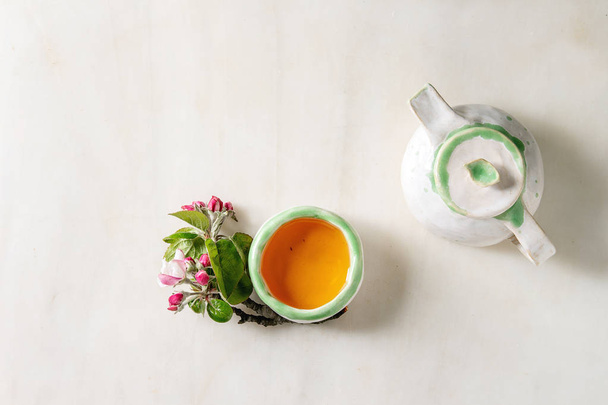 Tea in ceramic teapot - Фото, изображение
