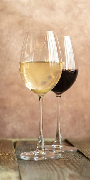Glasses of white and red wine - Photo, Image
