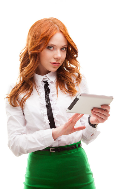 Red woman holding tablet - Foto, imagen
