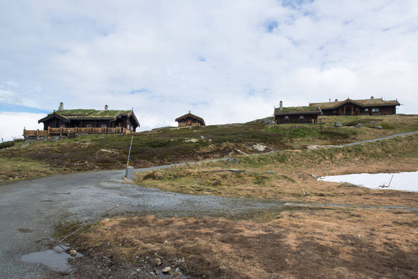 Traditional norwegian houses with grass in Tyinstolen, Norway  - 写真・画像