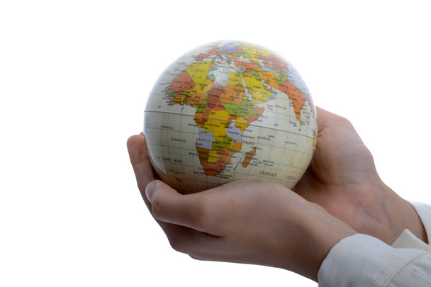 Child holding a globe - Fotó, kép