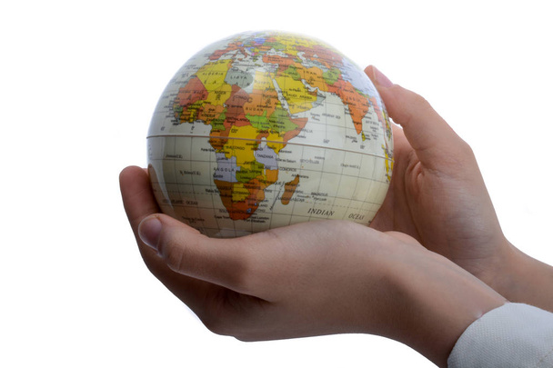 Child holding a globe - Фото, зображення