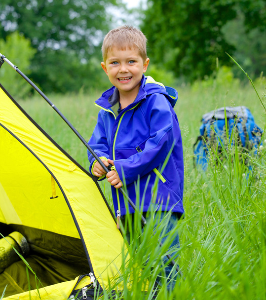 young boy camping with tent - Fotó, kép