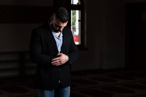 Businessman Muslim Praying in Mosque - Photo, image