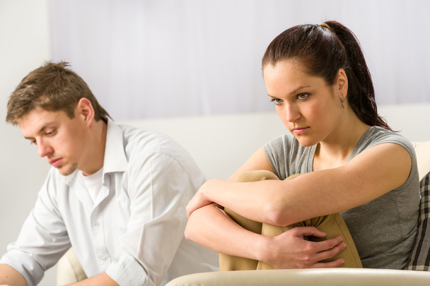 Unhappy couple sitting silently after argument - Foto, imagen