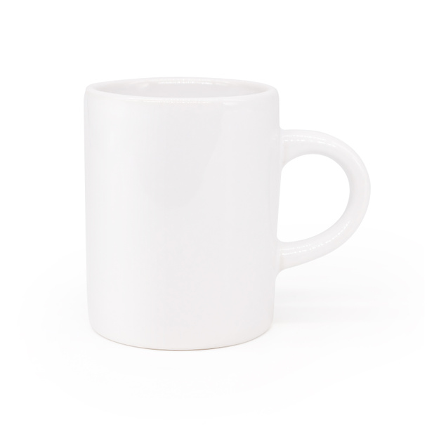 White ceramic handle mug on isolated background with clipping path. Blank drink cup for your design. - Photo, Image