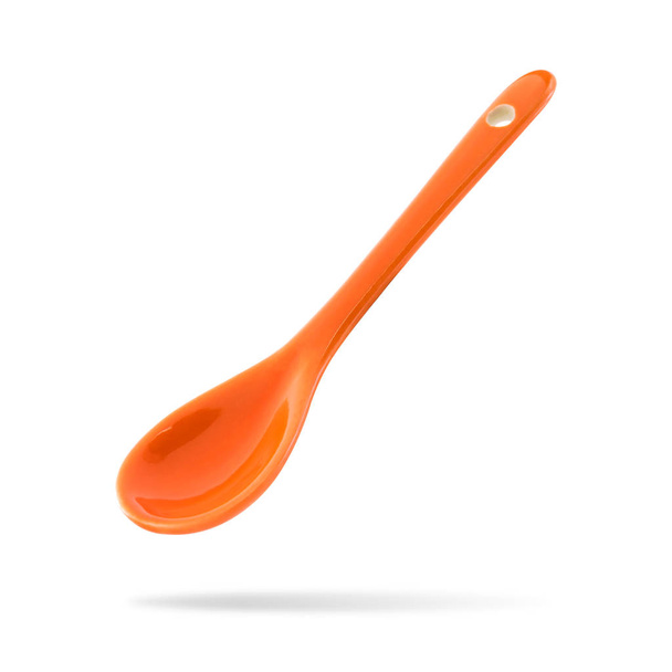 Ceramic spoon isolated on white background. Tablespoon for eat soup. Clipping paths object. - Photo, Image