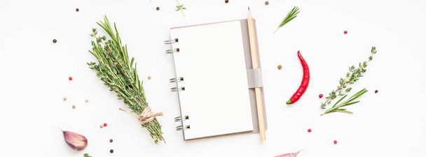 Blank notepad pages with greens herbs and spices - Photo, Image